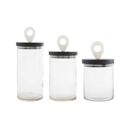 Clear glass canister with a white marble handle lid