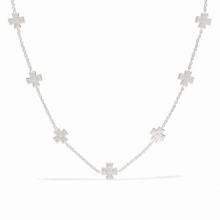 Silver station necklace with hand-hammered cross pendants on a delicate rope chain