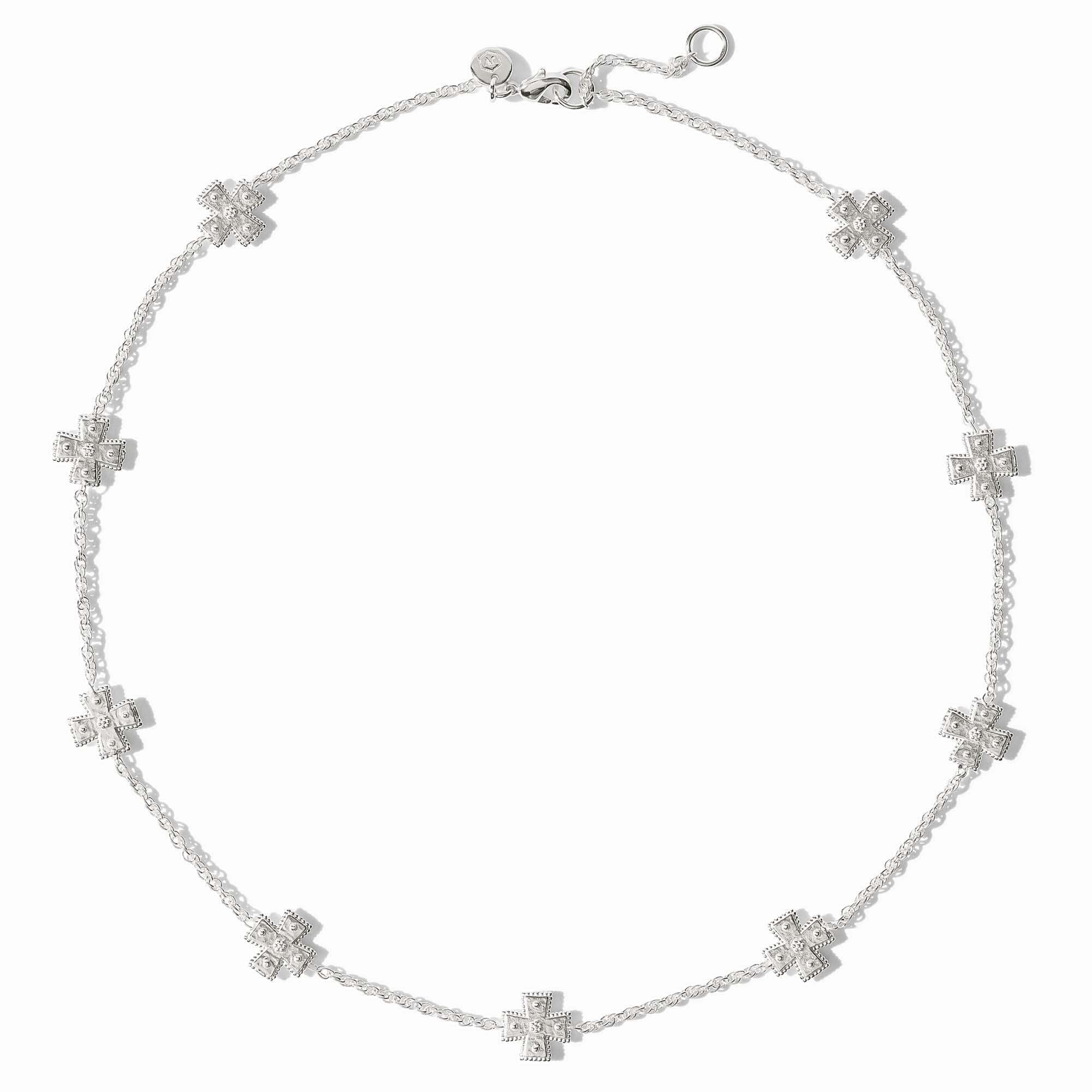 Silver station necklace with hand-hammered cross pendants on a delicate rope chain