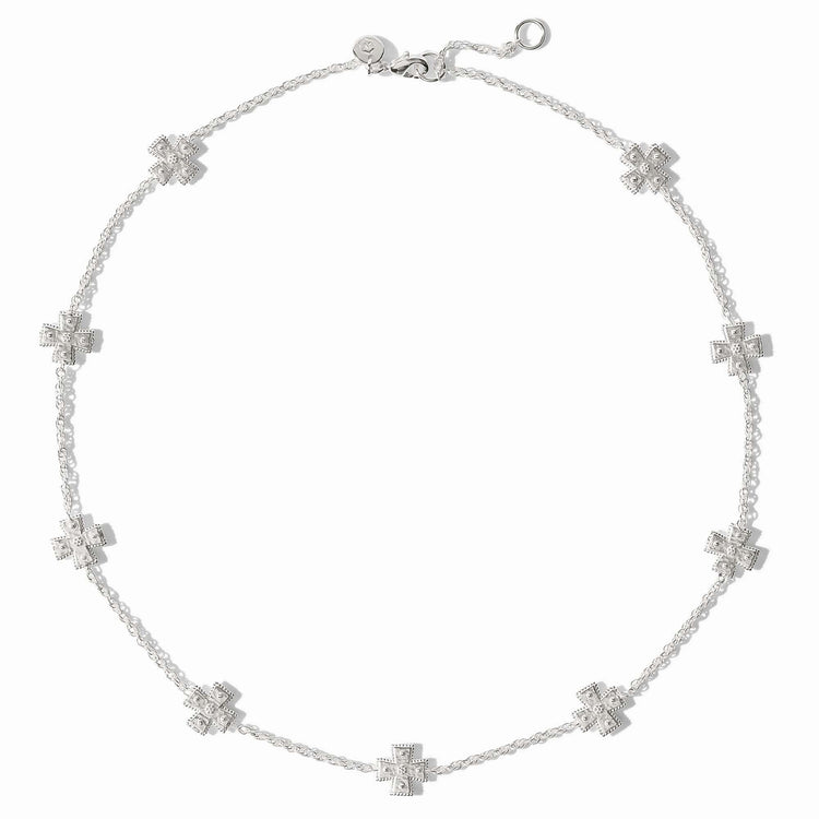 Silver station necklace with hand-hammered cross pendants on a delicate rope chain