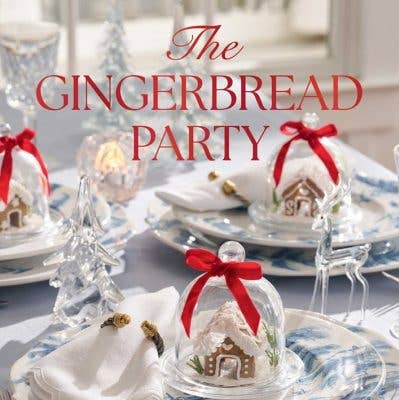 Festive table setting with gingerbread houses under glass domes and 'The Gingerbread Party' text.