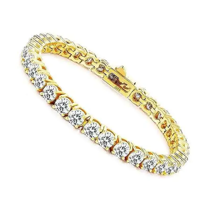 Gold tennis bracelet featuring a row of round-cut diamonds in a four-prong setting.