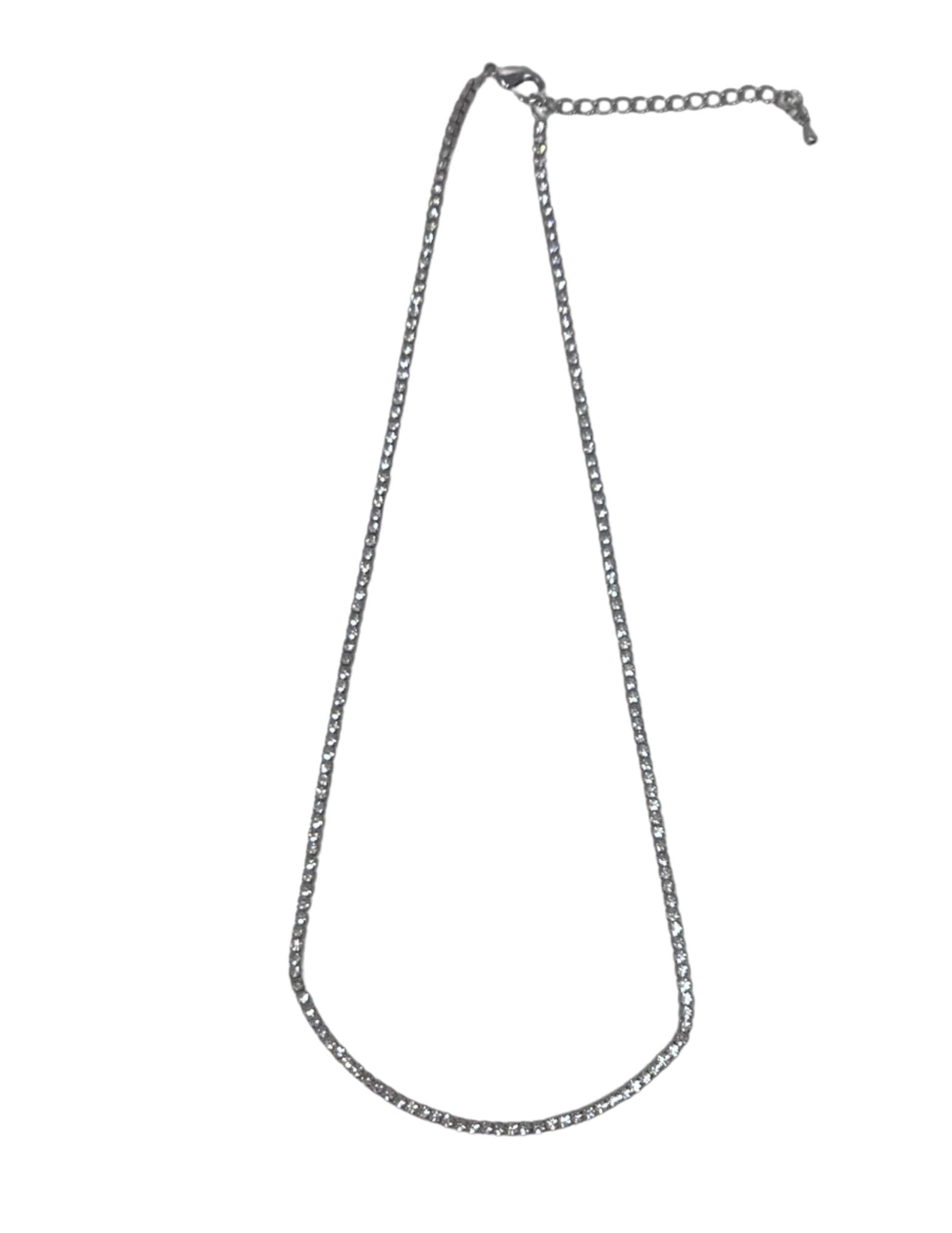 Silver-toned crystal tennis necklace with a lobster clasp and adjustable extender chain.