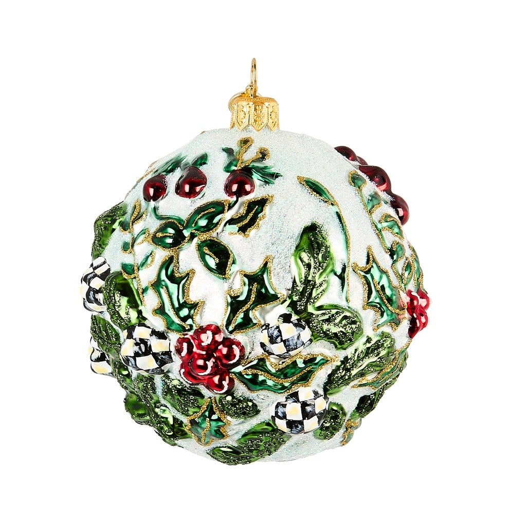Hand-painted mouth-blown glass ornament shaped like a red cardinal with brass logo charm