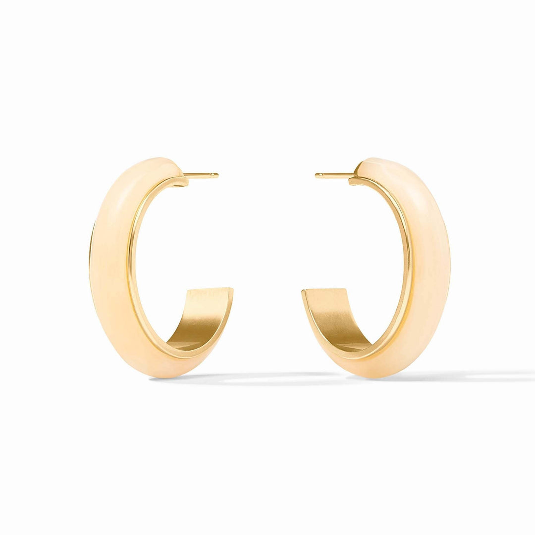 Medium ivory Carnaby hoop earrings with acetate posts featuring a polished gold finish.