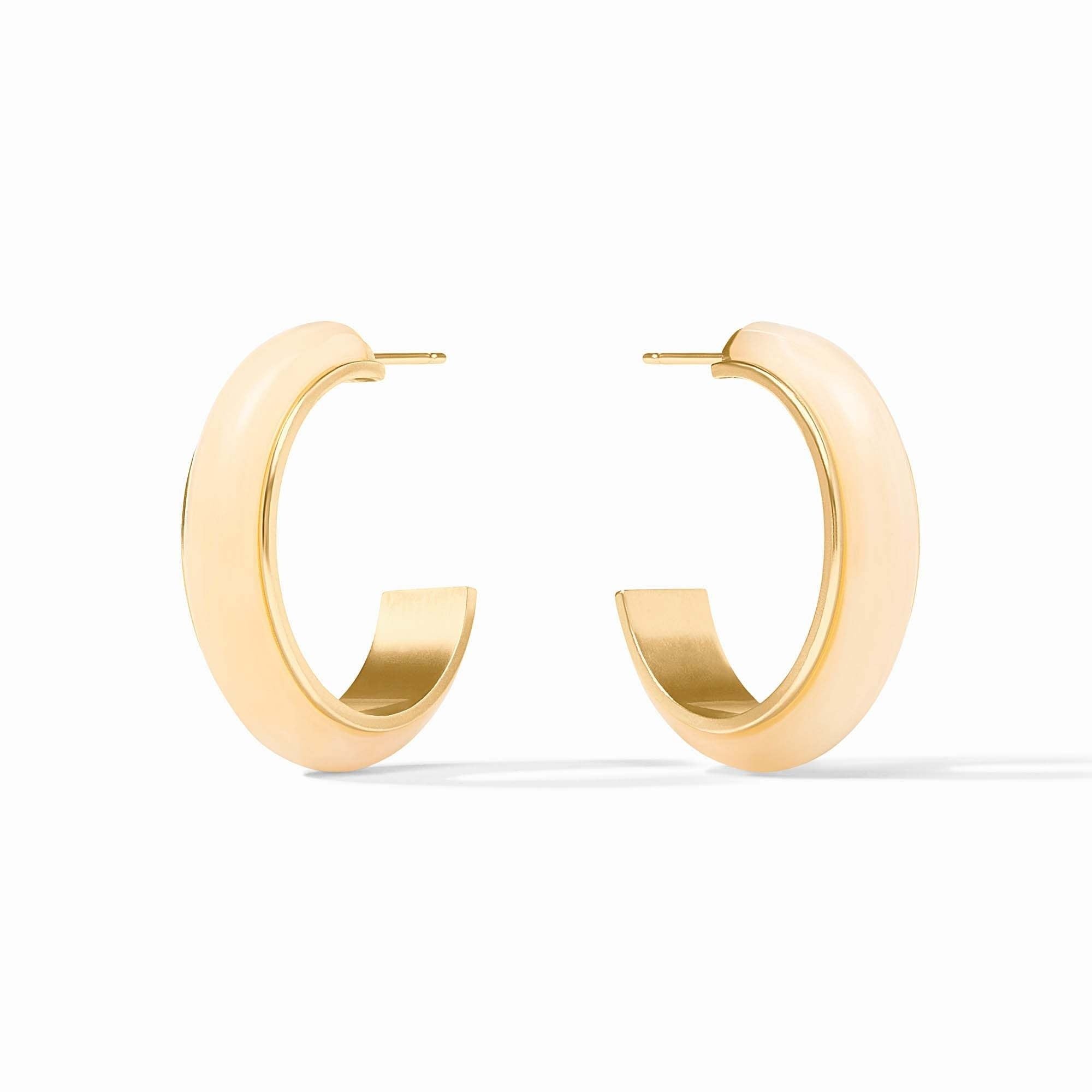 Medium ivory Carnaby hoop earrings with acetate posts featuring a polished gold finish.