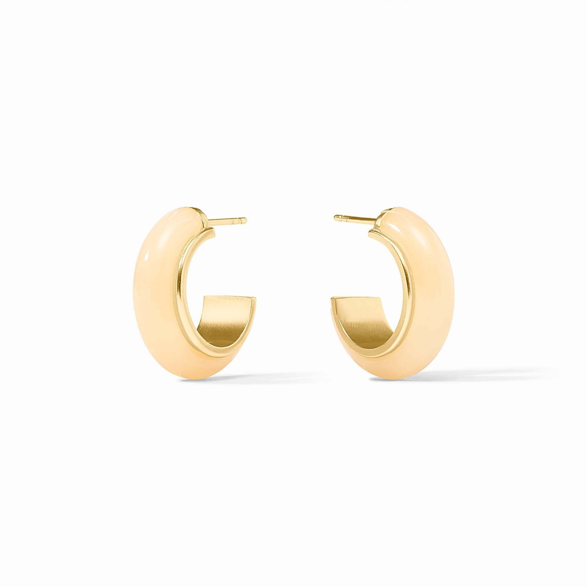 Ivory acetate hoop earrings with a gold-plated finish.