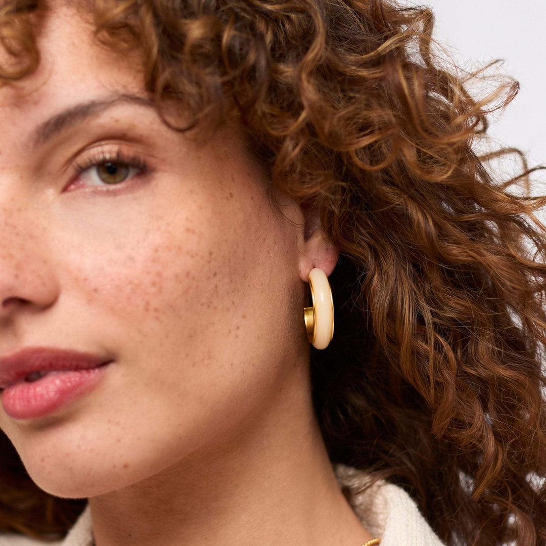 Gold-plated acetate hoop earrings with post backs