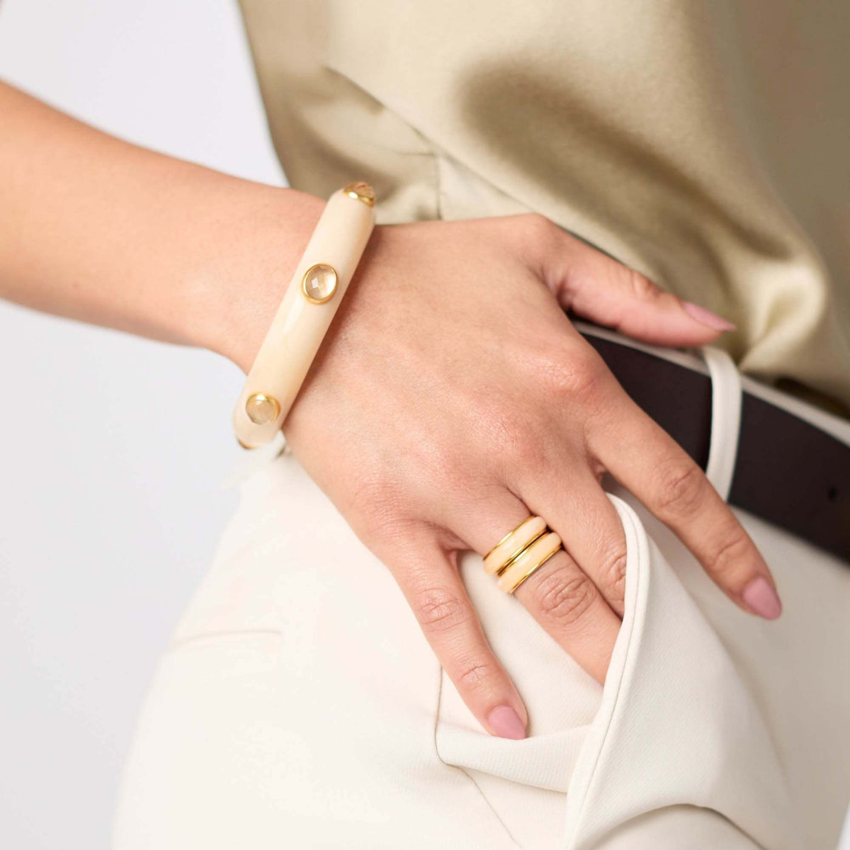 Sleek Carnaby Stone bangle in acetate with imported glass stones and a wide gold-plated band.