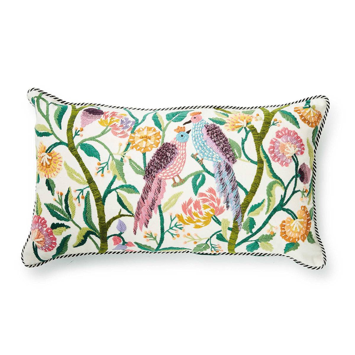 Carnivale lumbar pillow with dimensional embroidery of two birds among florals on cotton fabric.