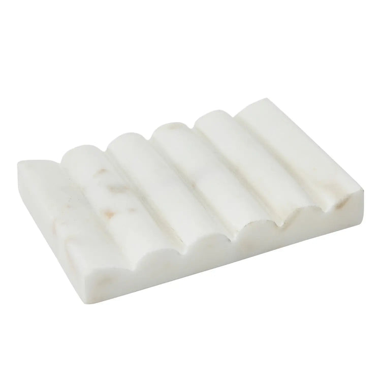White carved marble soap dish with a groove drainage design