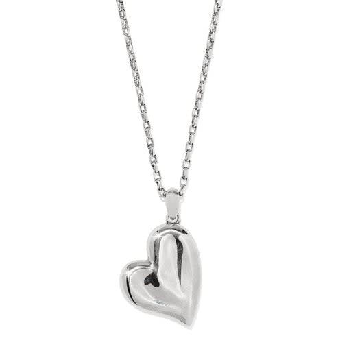 Reversible silver-gold plated heart necklace with water ripple pendant detail on a chain.