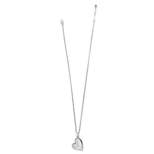 Reversible silver-gold plated necklace with a sculpted heart pendant featuring water ripple texture.