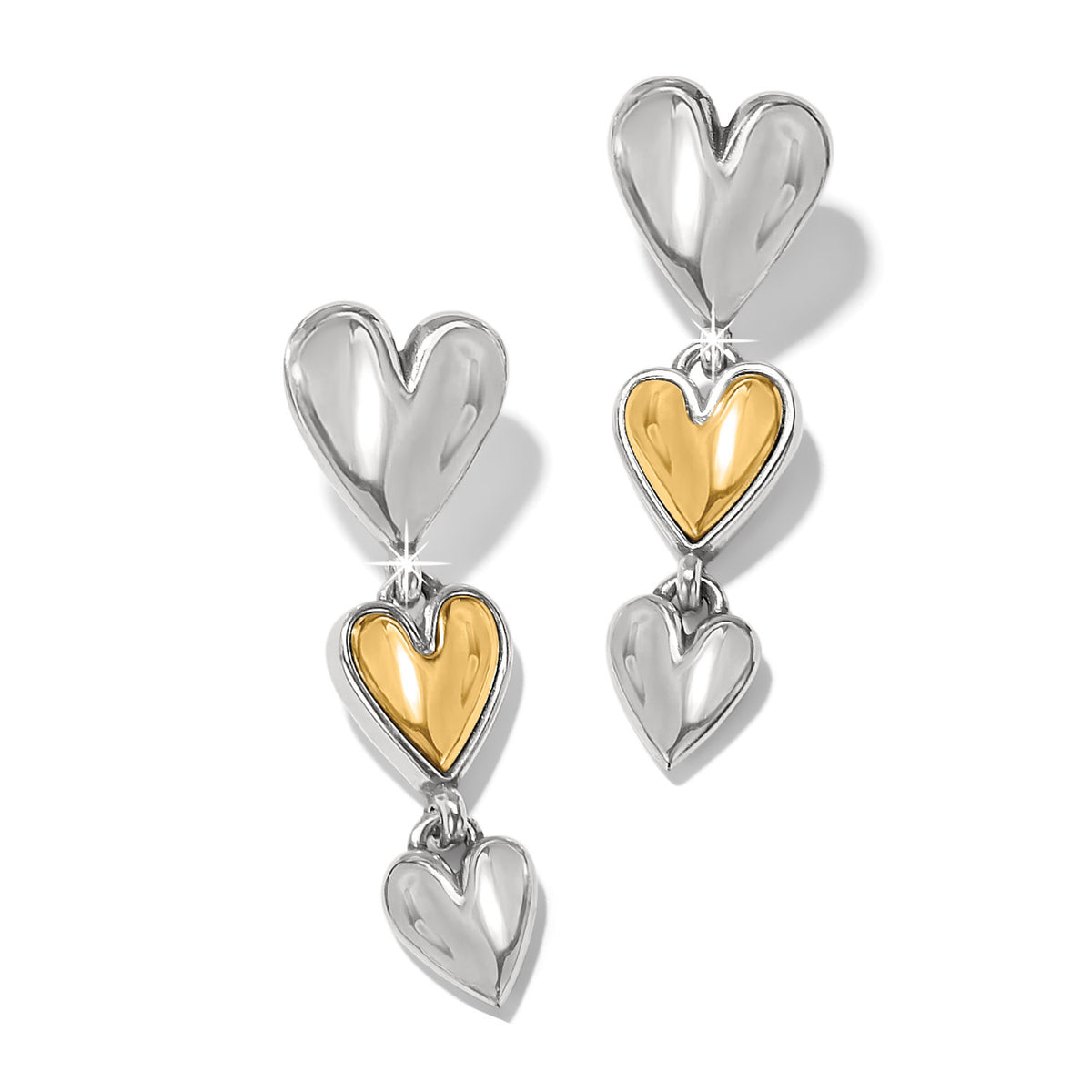 Silver post earrings with flat disc backs featuring a cascading trio design where silver hearts frame smaller golden ones.