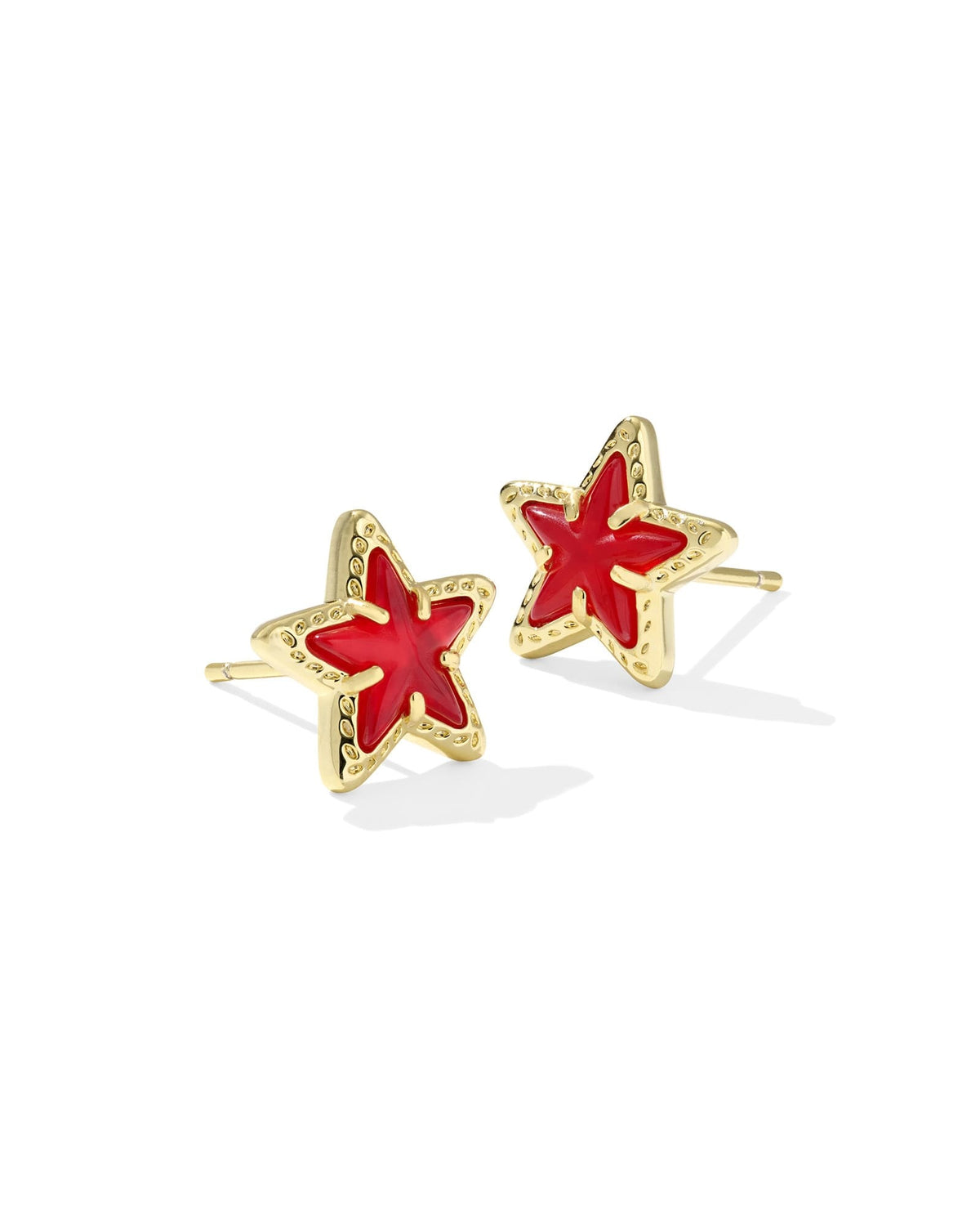 Gold Cassidy stud earrings featuring a red illusion star-spangled stone on an ear post.