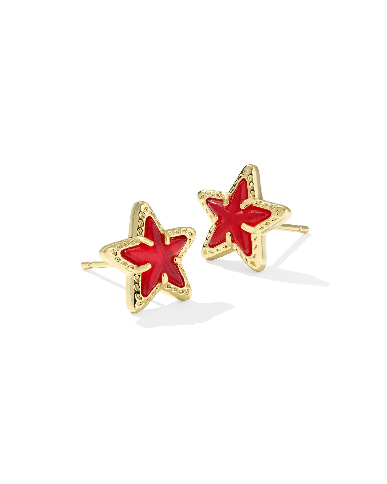 Gold Cassidy stud earrings featuring a red illusion star-spangled stone on an ear post.