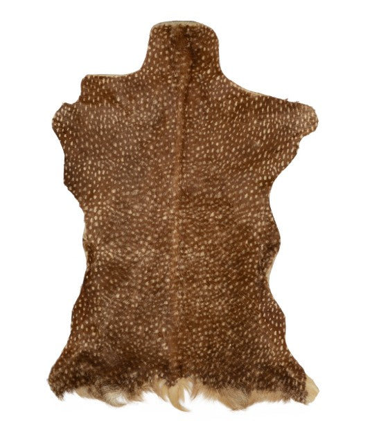 Spotted brown and white printed goat hide rug with natural irregular edges.