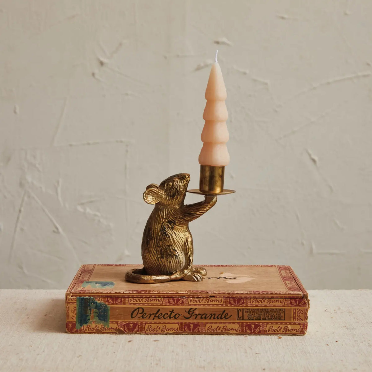 Cast aluminum mouse-shaped taper candleholder in antique gold finish