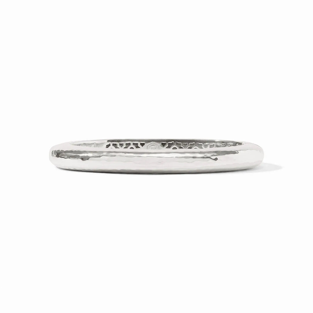 Silver oval hinge bangle with a lightly hammered texture.
