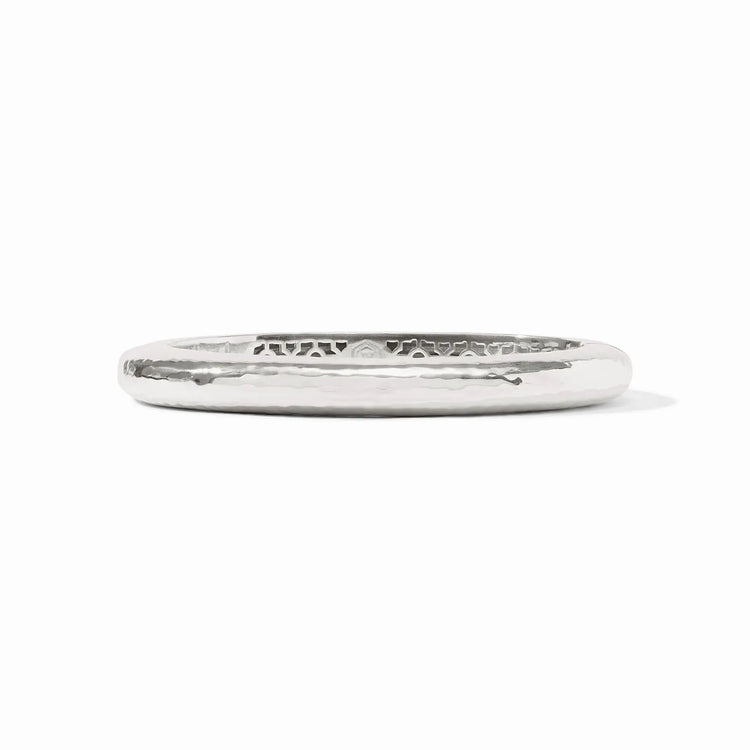 Silver oval hinge bangle with a lightly hammered texture.