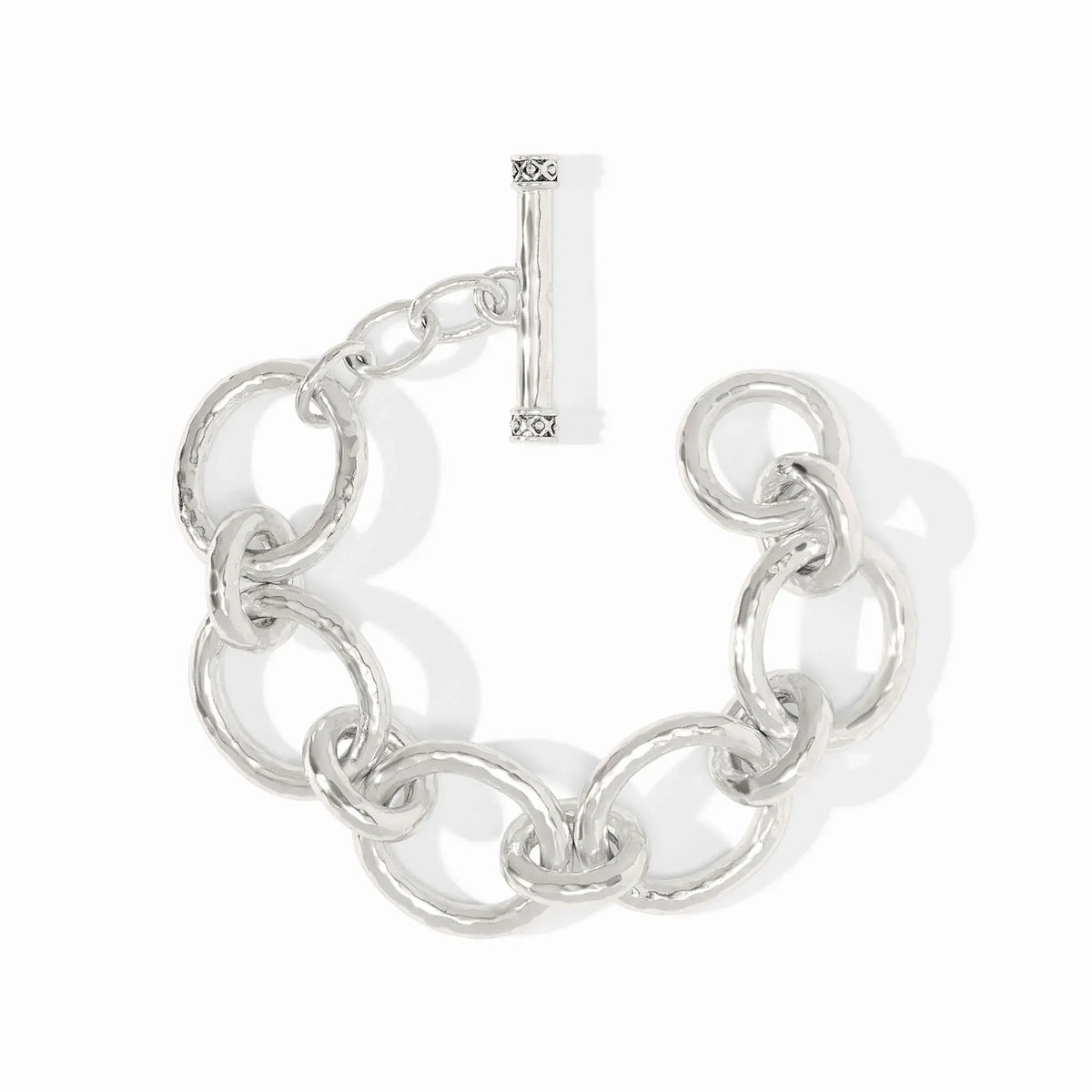 Silver hammered link bracelet with a pierced inner toggle clasp