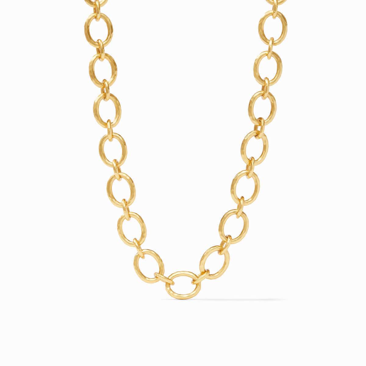 Adjustable gold link necklace with pearl endcaps on a toggle clasp