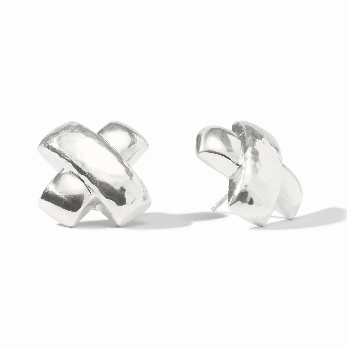 Silver X-shaped earring with a hammered bar overlapping a smooth satiny finish