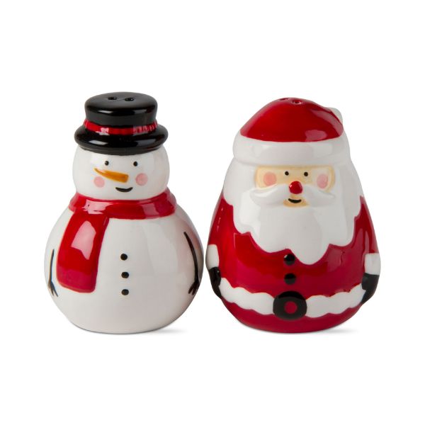 Earthenware salt shaker shaped like a smiling Santa with red hat and white beard.