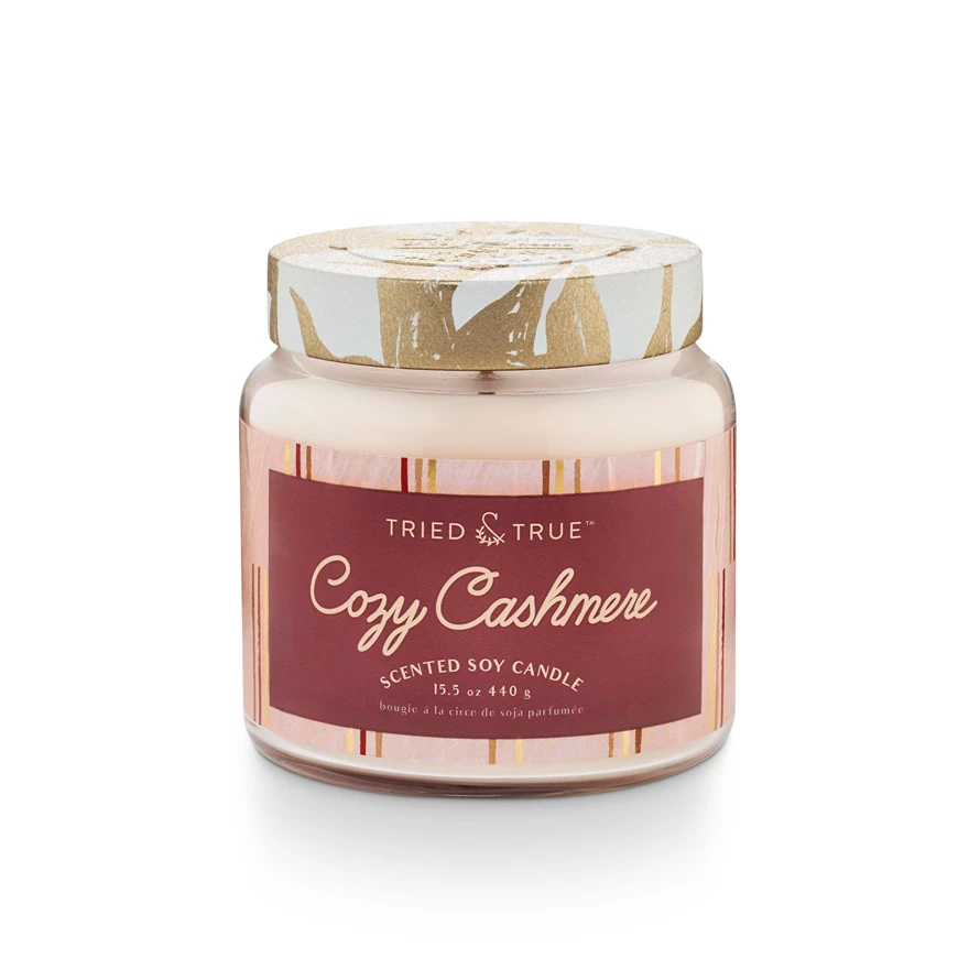 Large jar containing cozy cashmere product in a neutral tone.