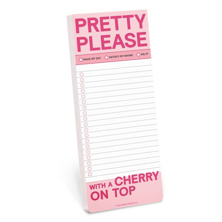 White memo pad with a pink heart-shaped hole punch on the cover featuring handwritten-style text.