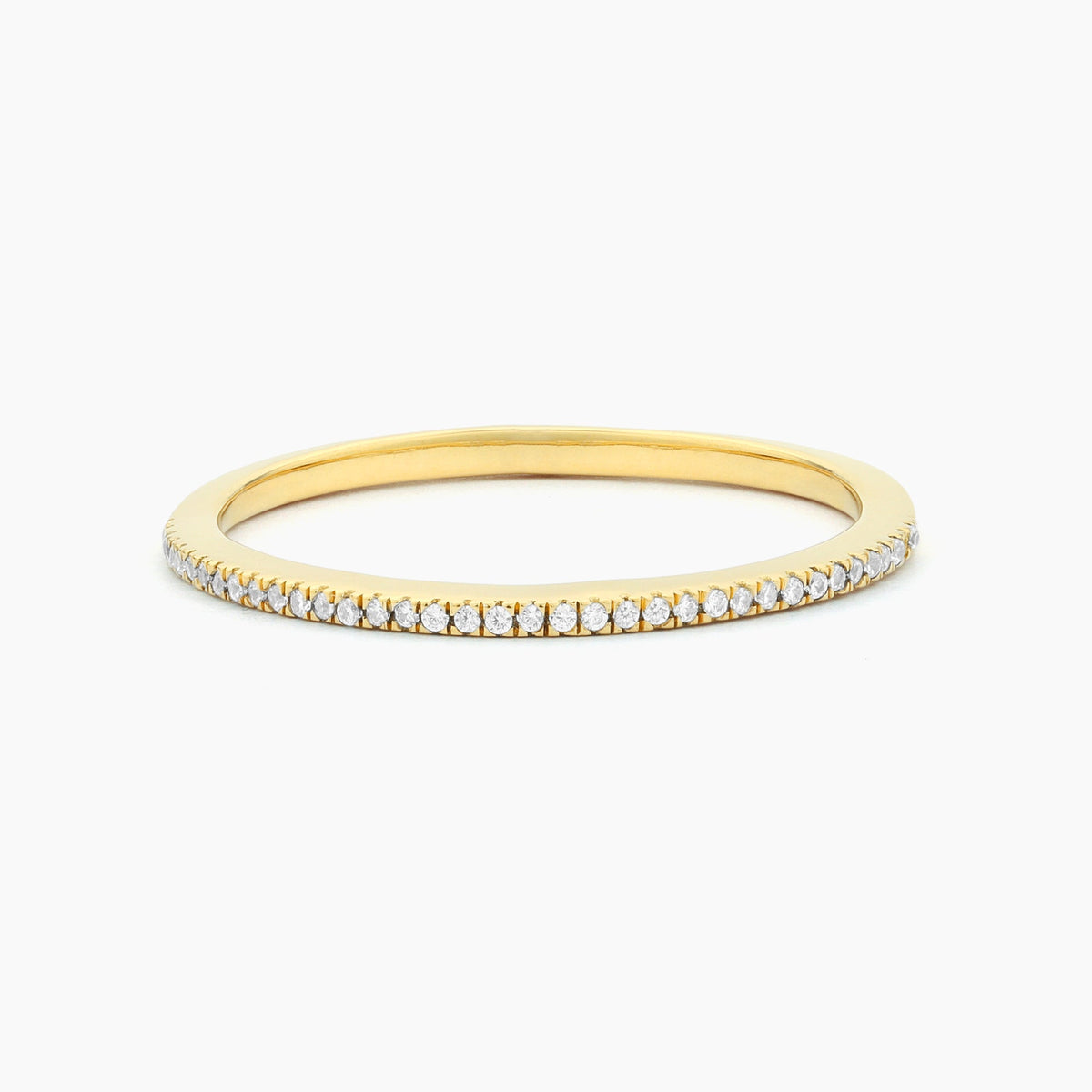 Gold plated Waterproof For All Eternity Stackable Ring with small diamonds on a 1.10 mm band.