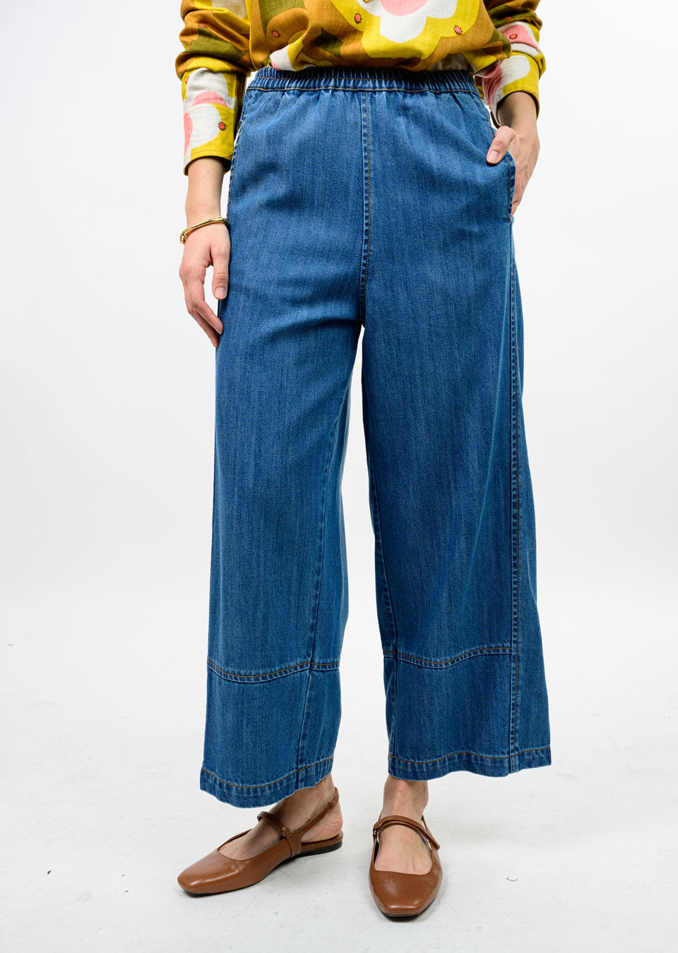 Person wearing Maxine Barrel Jeans, wide-leg cropped denim pants with an elastic waistband.