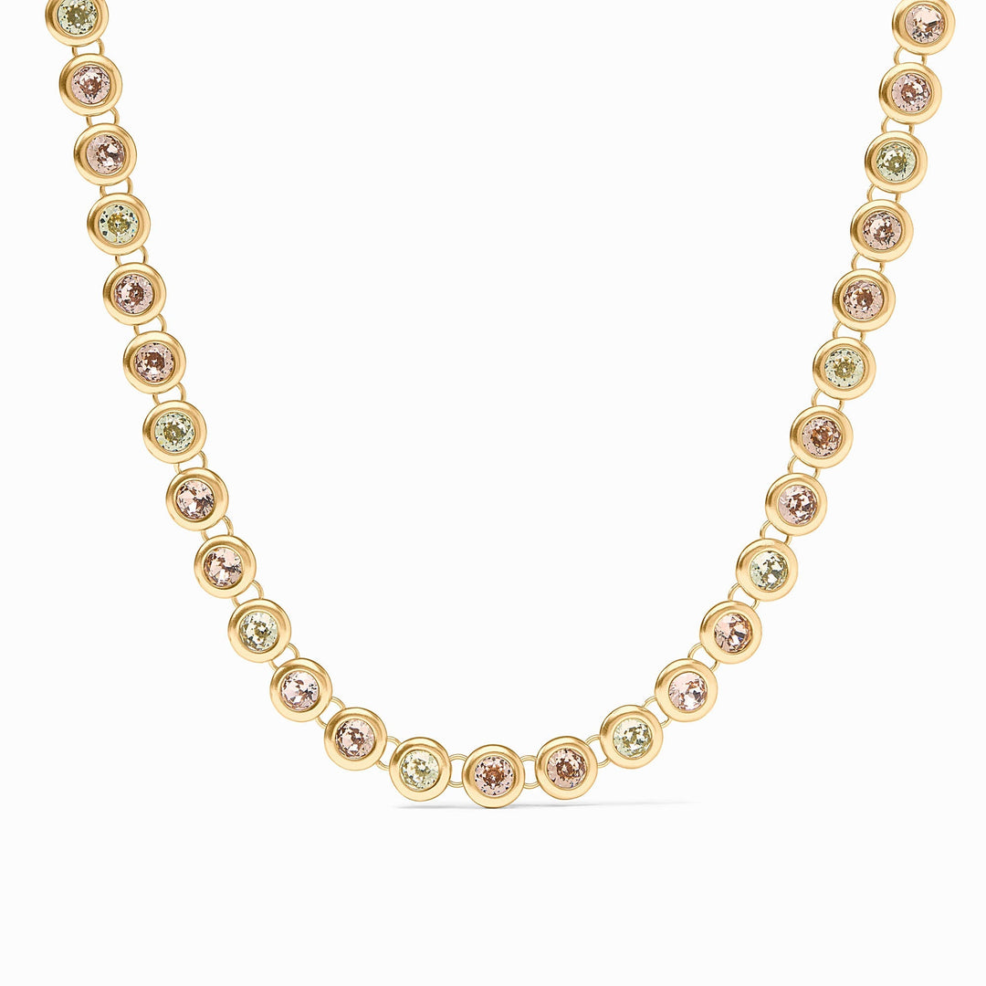 Adjustable rainbow tennis necklace with vibrant imported glass stones on a 24K gold plate chain.