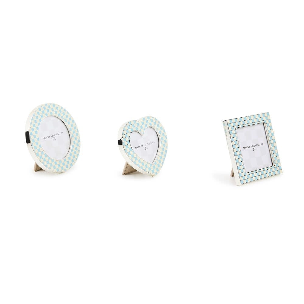 Set of three assorted silver-plated frames in baby blue enamel checks with ivory accents; heart, circle, and square silhouettes.