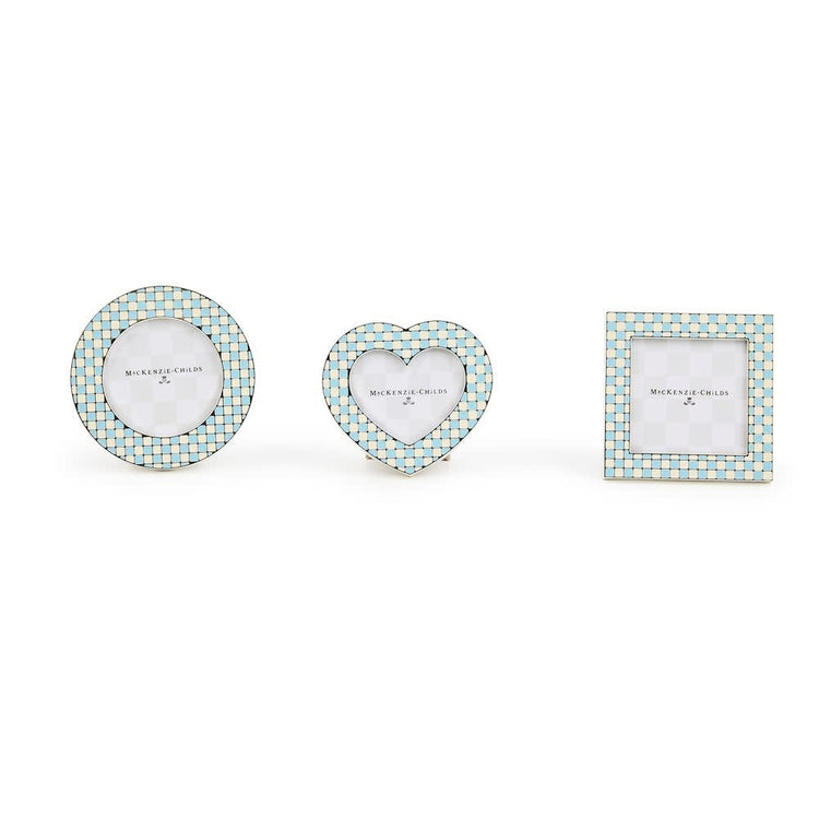 Set of three silver-plated frames in baby blue enamel checks with ivory accents; heart, circle, and square shapes.