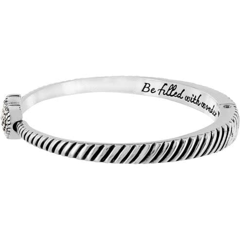 Silver plated hinged bangle with etched message "Be filled with wonder" and a heart featuring fine quality crystals.