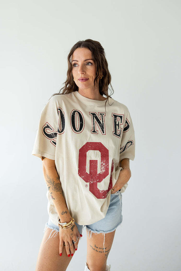 Oversized white cotton t-shirt with a split neckline graphic print