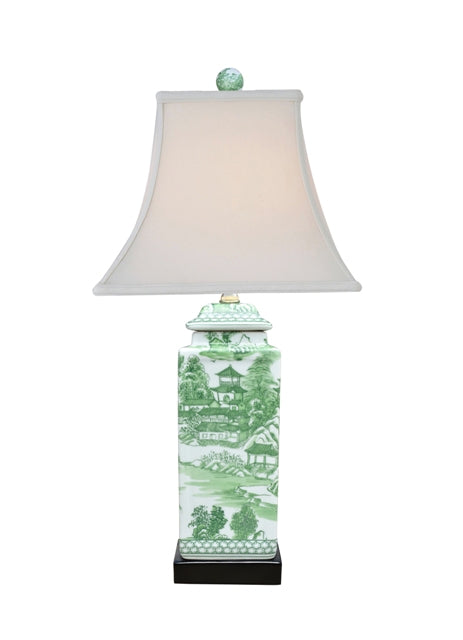 Porcelain green chinoiserie square jar lamp with an off-white square bell shade on a black base.