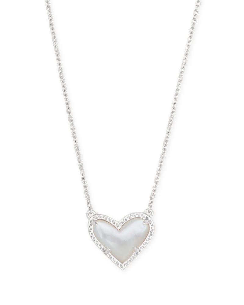 Ari Heart Short Pendant Necklace featuring an asymmetrical heart-shaped pendant on a silver chain.