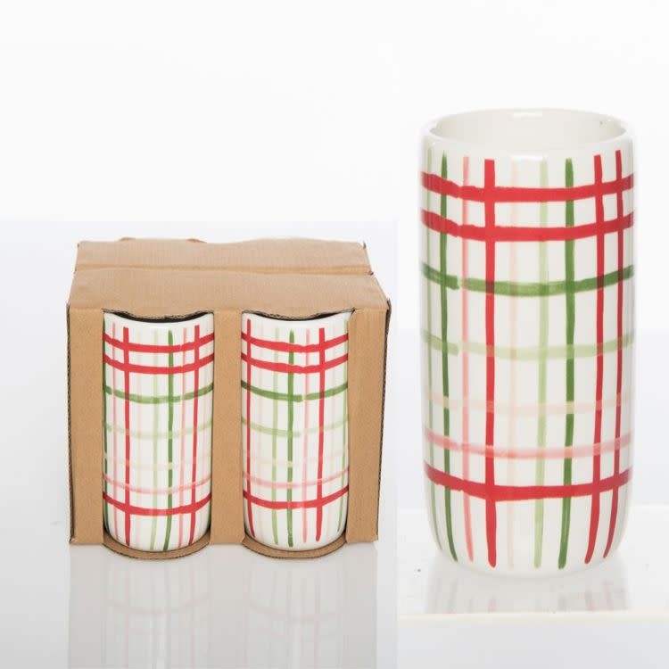 Ceramic tumbler with red plaid pattern on white background