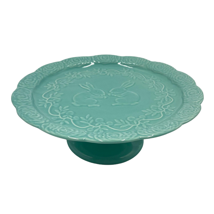 Green ceramic cake stand with square base and pedestal height