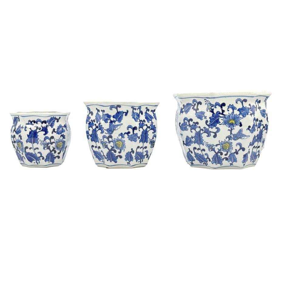 Blue ceramic Chinoiserie planter pot with yellow accents, featuring a round silhouette and intricate hand-painted fluting details.