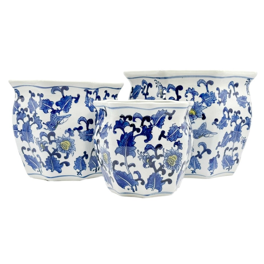 Blue ceramic planter pot with yellow accent, featuring hand-painted Chinoiserie fluting and a classic porcelain silhouette.