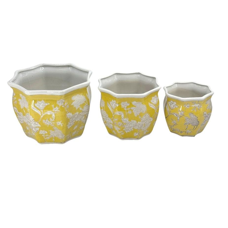 Yellow ceramic planter pot with white fluted sides and chinoiserie-inspired hand-painted detailing
