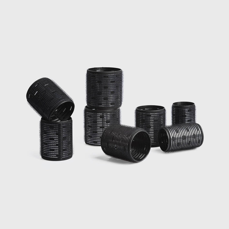 Eight-piece variety pack of black ceramic thermal hair rollers in assorted sizes.