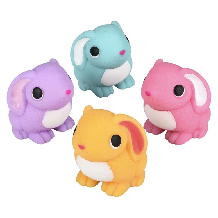 Squishy Easter bunny toy in pastel pink with stretchable fabric texture