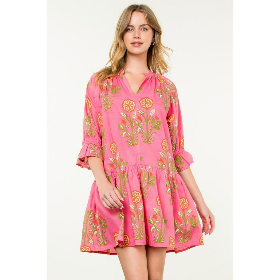 Hazel woven cotton short sleeve dress with floral print in a relaxed A-line silhouette.