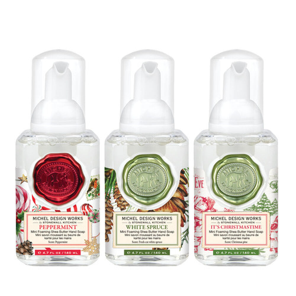 Three mini foaming soap dispensers in complementary scents and designs packaged together.