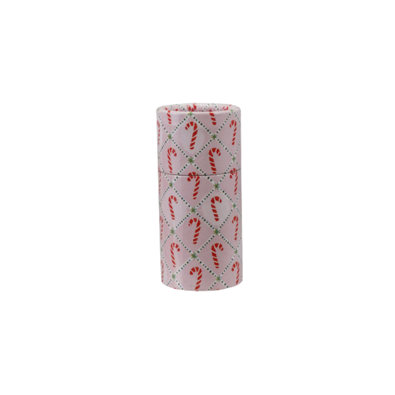 Pink tube matchbox with a candy cane and green star diamond pattern.