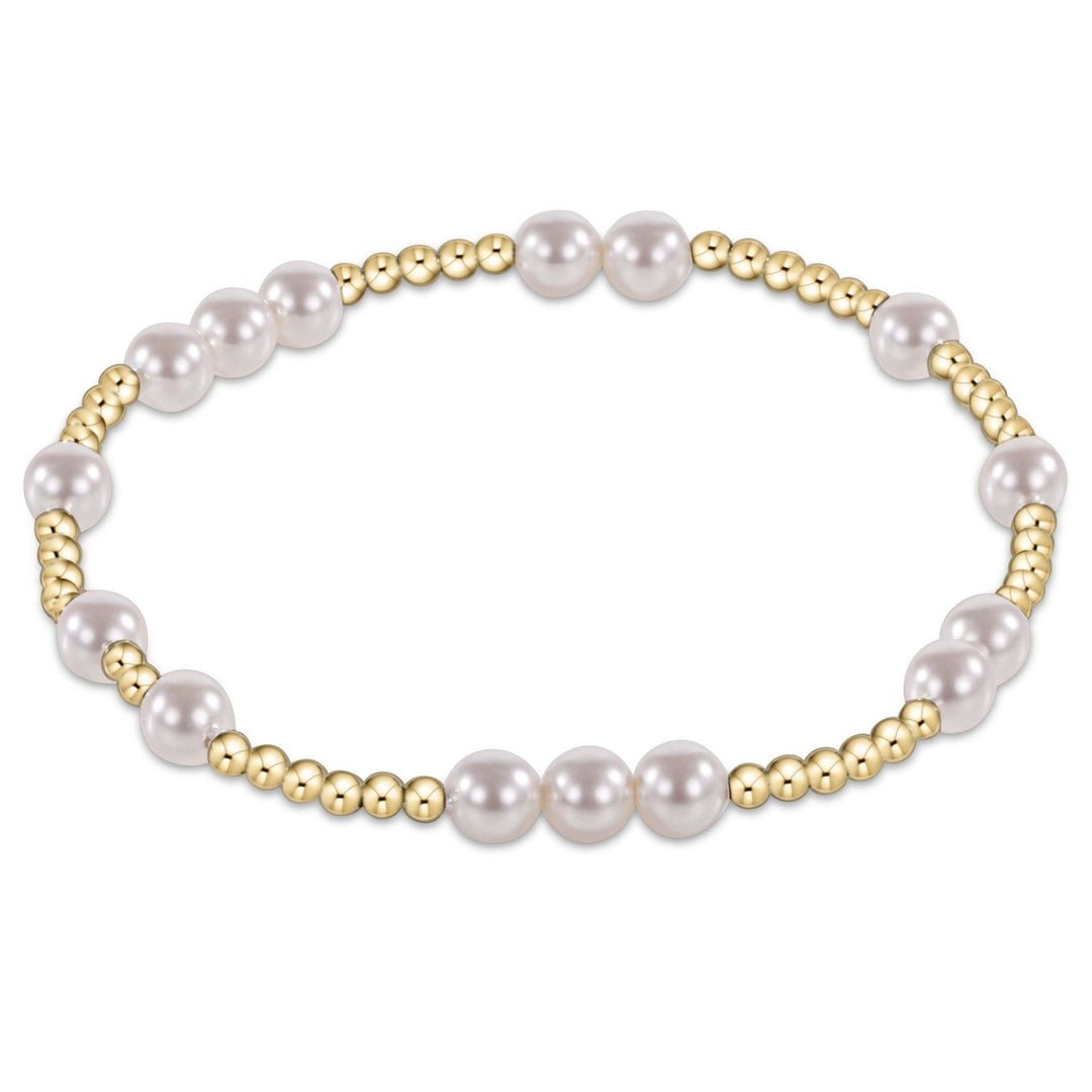 Hope Unwritten bracelet featuring 5mm white crystal pearls and 2.5mm 14kt gold-filled beads.